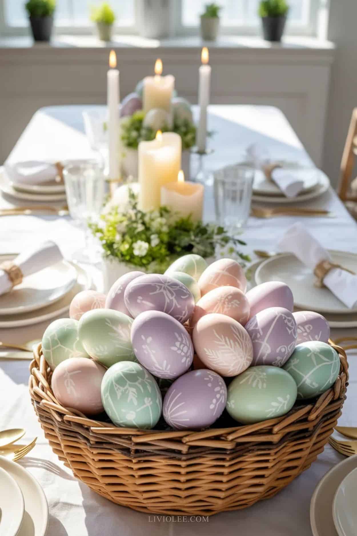 Elegant Easter tablescape featuring a decorative egg centerpiece in a basket with greenery and spring tableware
