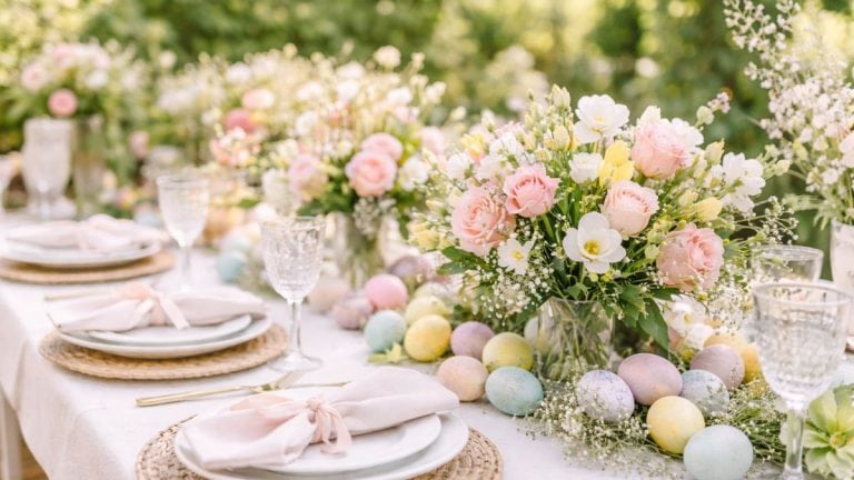 Easter tablescape styled for spring celebration, long table decorated with pastel eggs, fresh floral arrangements, elegant tableware and soft linen napkins