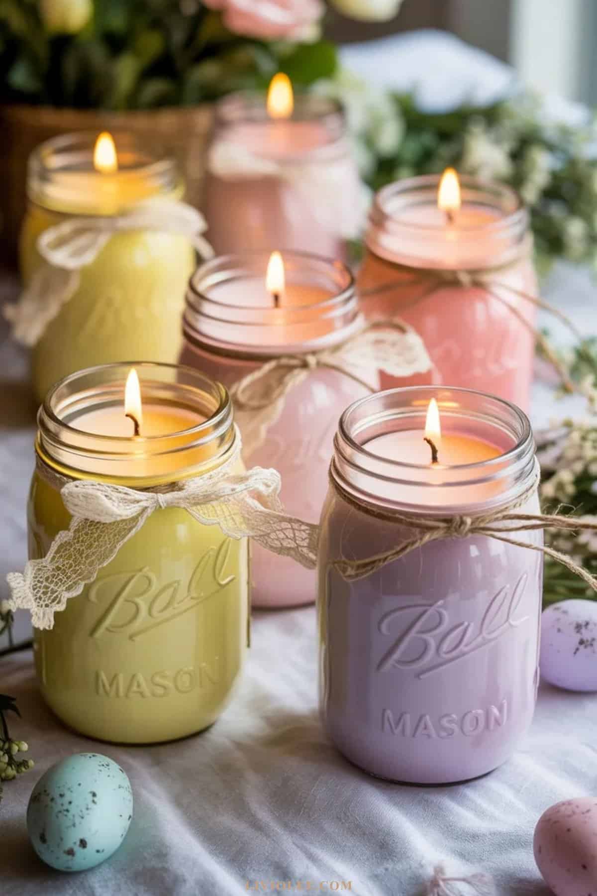 pastel mason jar candle holders used as Easter table decorations