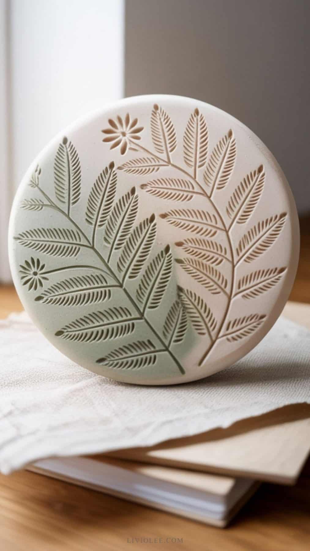 air dry clay paperweight embossed with leaves and two tone in color