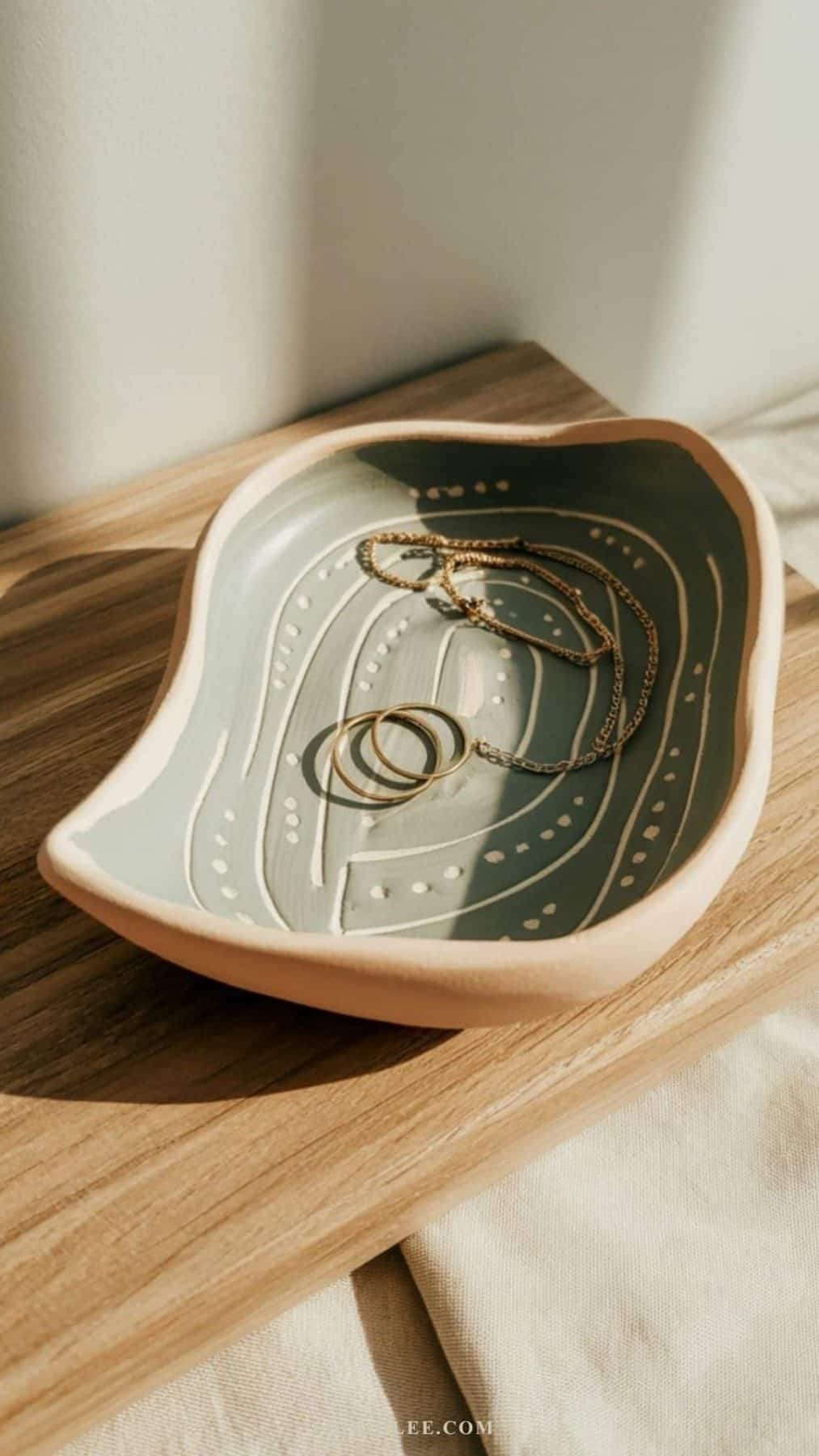 air dry clay trinket dish clay and green in color