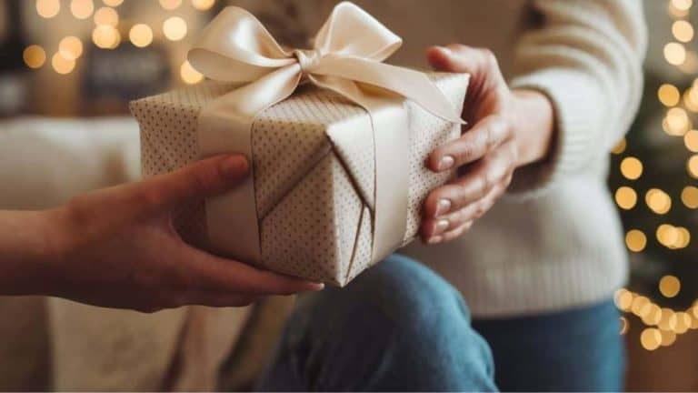 reasons to give a gift, hands giving a gift to another