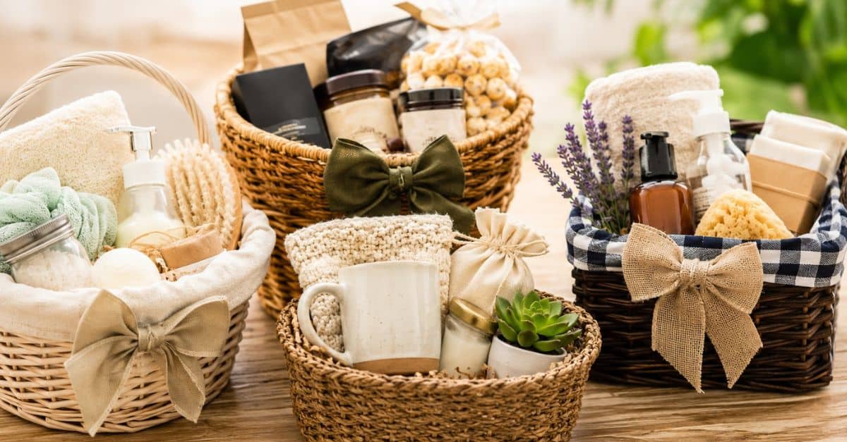 several store-bought gift baskets arranged on a rustic wooden table