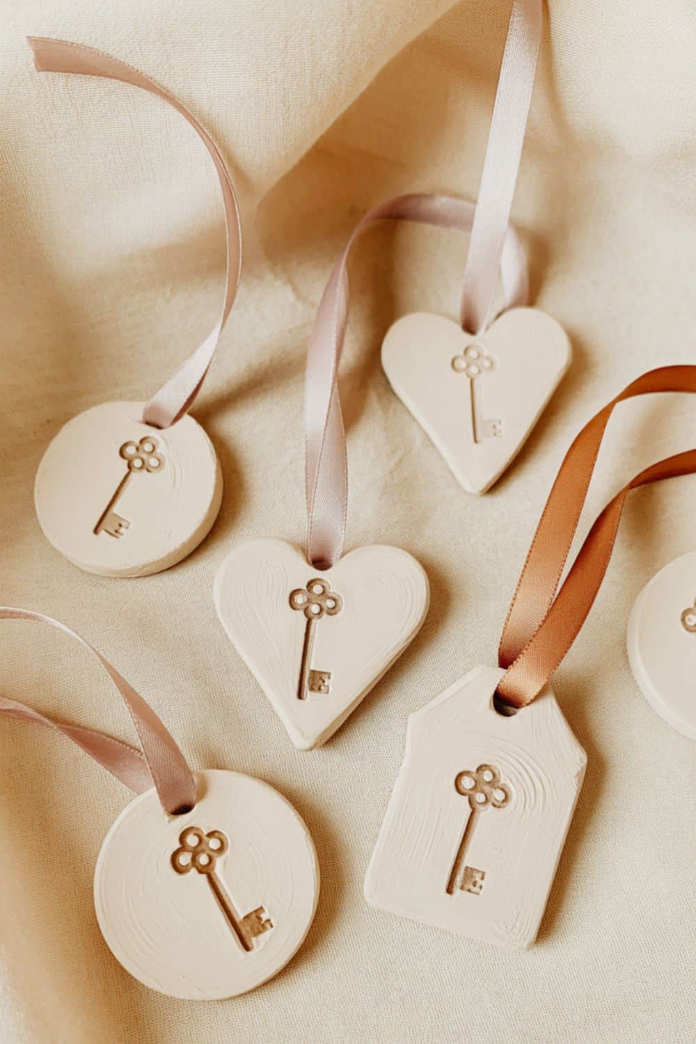 clay ornaments that have been pressed with vintage keys